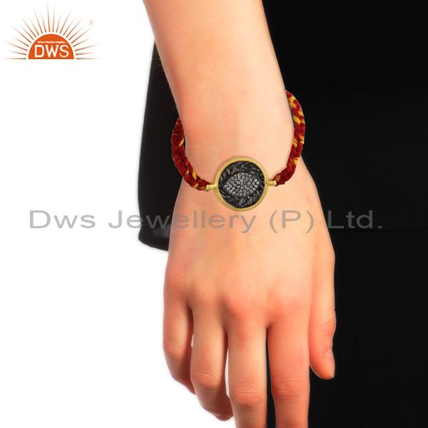 Eye shaped rhodium and gold plated silver zircon bracelet