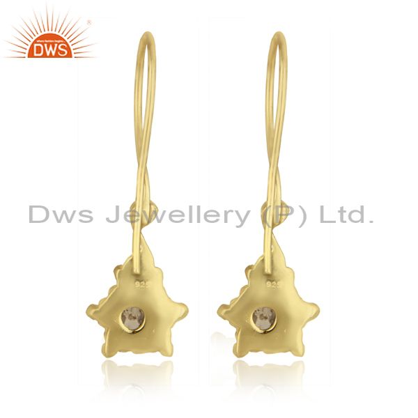 Designer dangle earring in yellow gold on silver studded with citrine