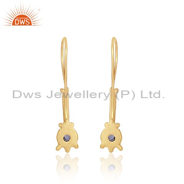 Elongated designer earring in yellow gold on silver with iolite