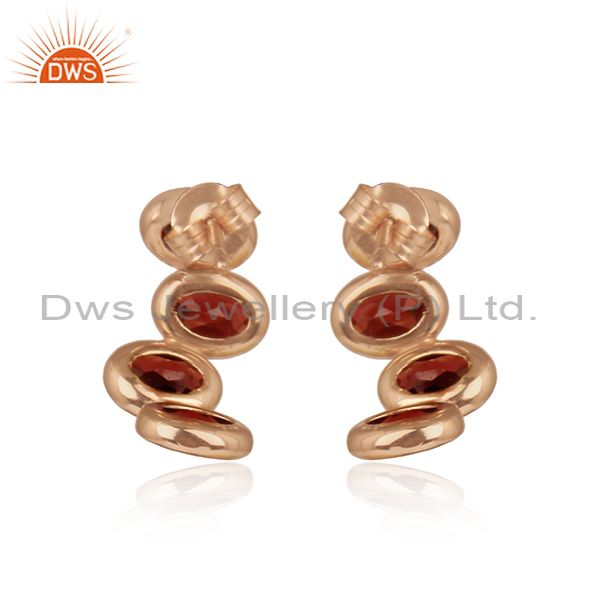Designer curved 3 stone rose gold on silver earring with garnet