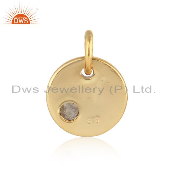 Designer of Dainty charm pendant in yellow gold on silver with labradorte