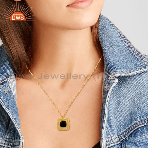 Hammer bold textured gold over silver black onyx chain pendant