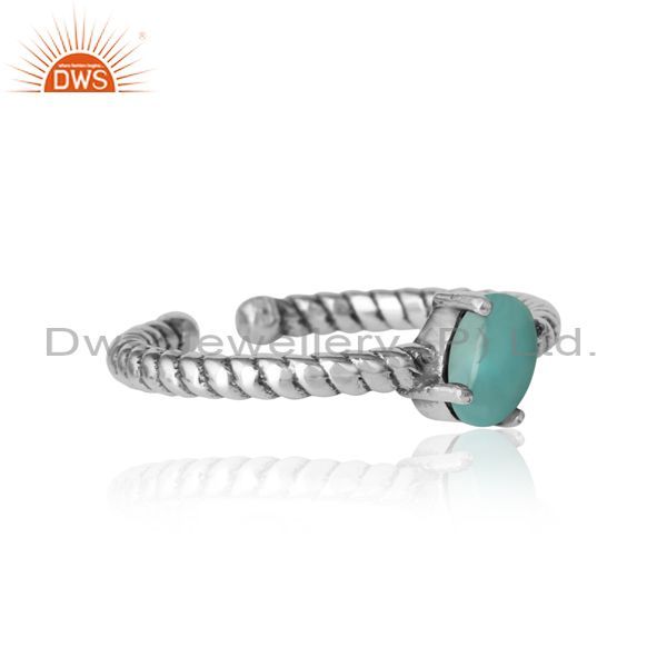Designer of Dainty oxidized silver ring adorn with tilted arizona turquoise