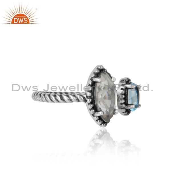 Designer of Twisted designer oxidized ring in silver blue topaz and crystal