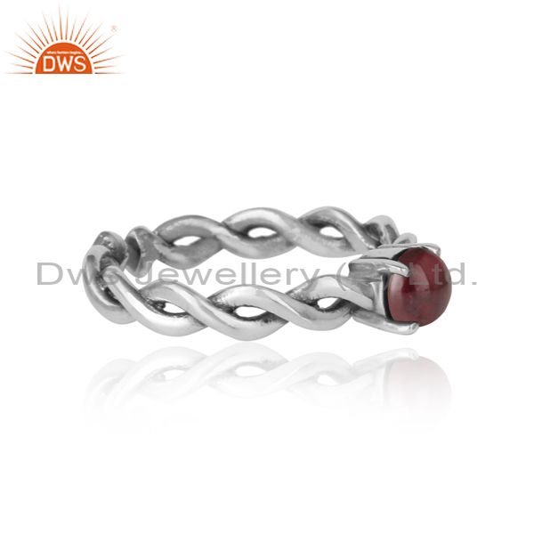 Designer of Dainty twisted ring in oxidized silver 925 with natural garnet