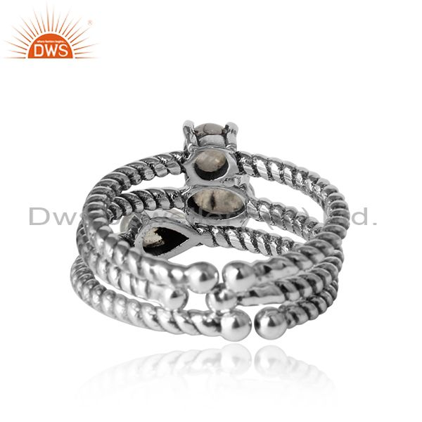 Designer of Twisted stackable oxidised silver ring set with rainbow moonstone