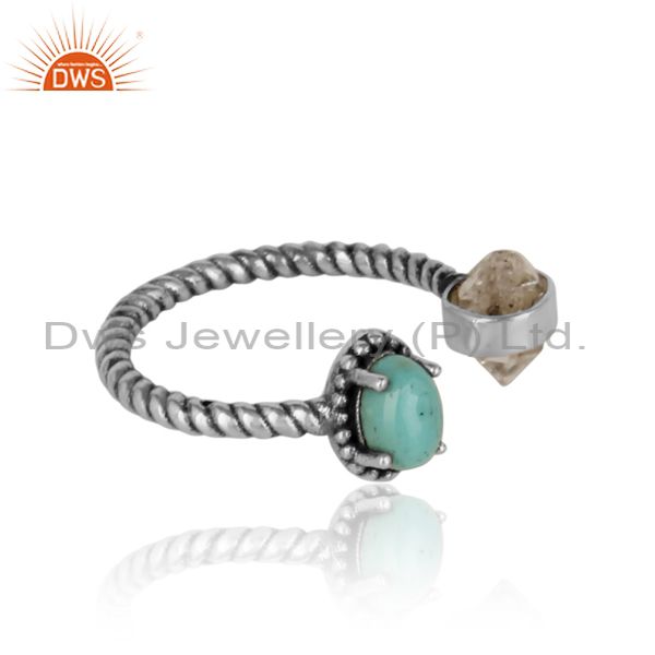 Designer of Herkimer diamond ring in oxidized silver with arizona turquoise