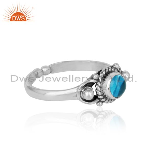 Designer of Handcrafted twisted textured blue topaz ring in oxidized silver