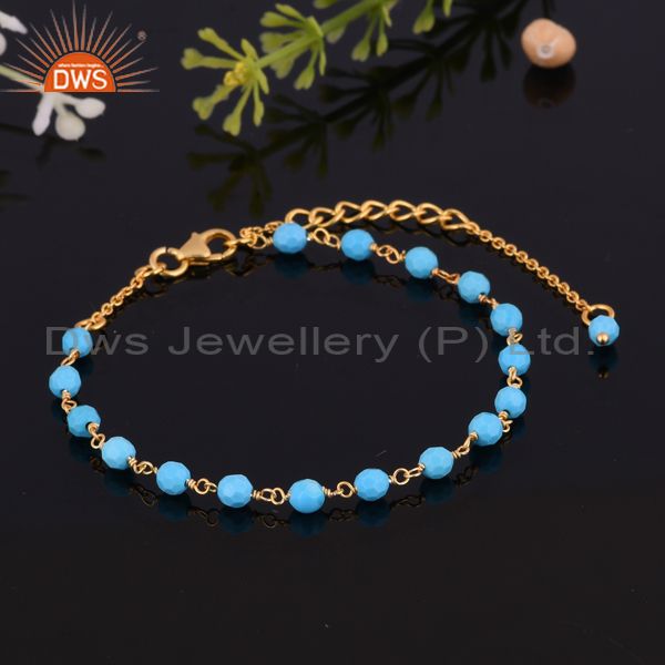 Handcrafted turquoise bead bracelet in yellow gold on silver