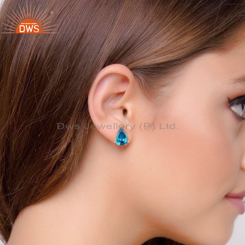 Designer dainty yellow gold on silver 925 studs with blue topaz