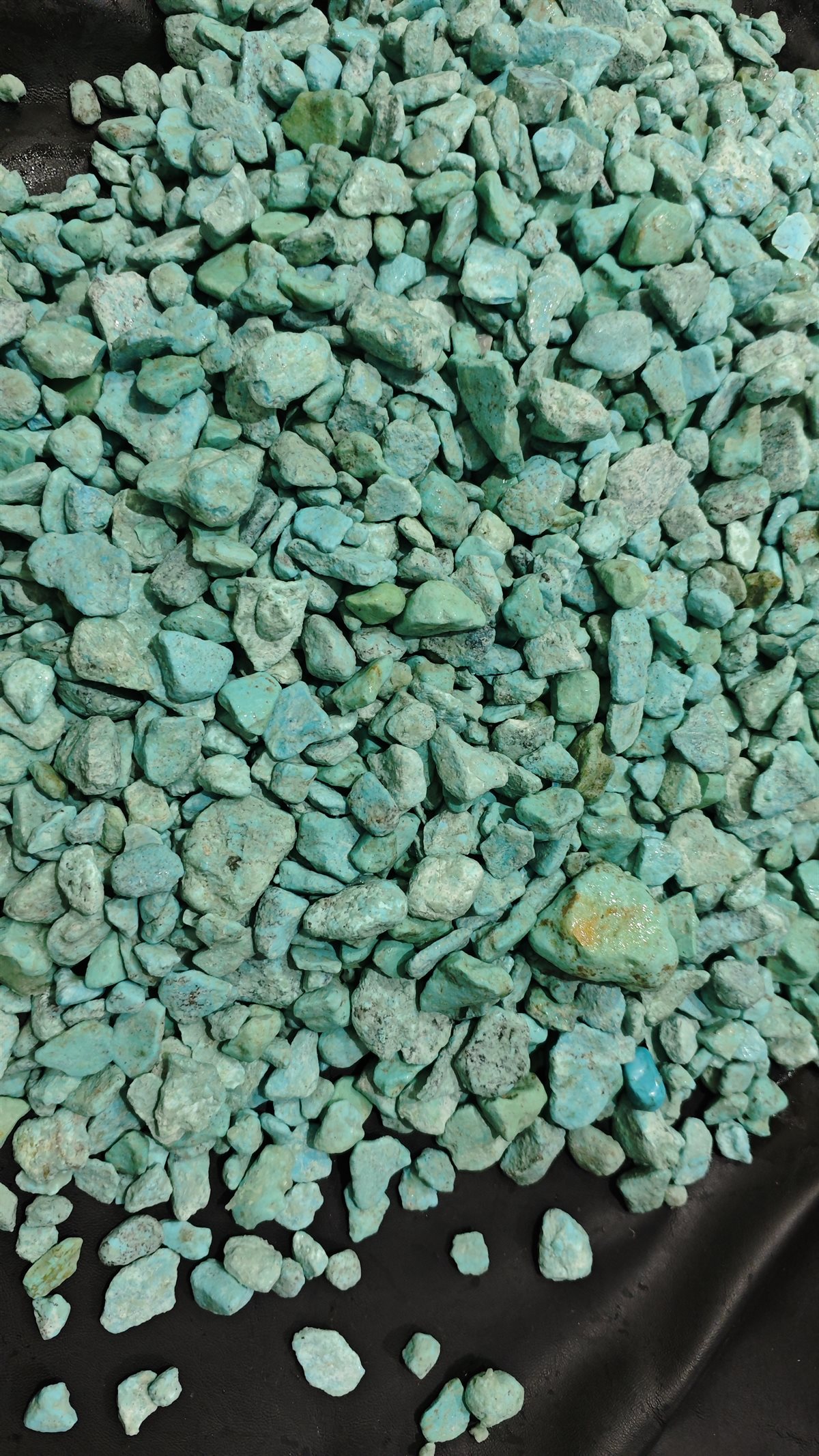 Rough turquoise before cutting at the DWS Jewellery gemstone department, Jaipur